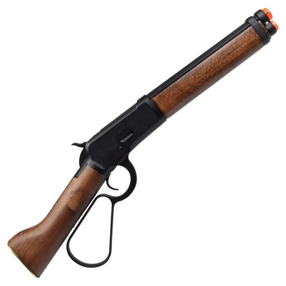 Balise alt SEO : "Carabine à gaz A&K Winchester M1873 noire, corps et canon en métal, crosse en bois, levier d'action en métal, chargeur interne 25 coups, hop-up réglable."