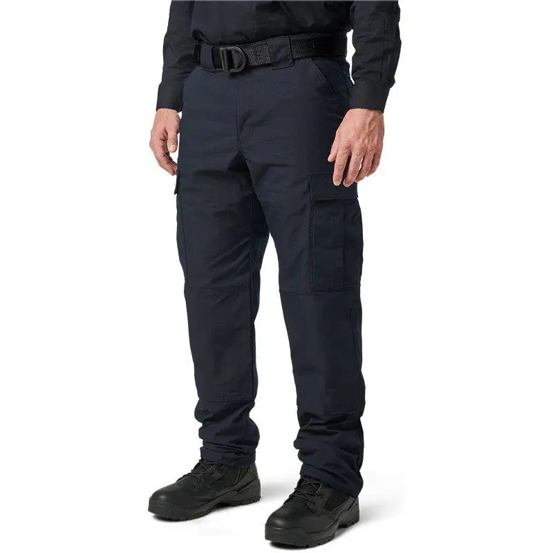 Un pantalon tactique Flex-Tac TDU Ripstop Dark Navy 5.11 durable et fonctionnel avec des caractéristiques spéciales telles que des poches cargo compatibles TacTec, une ceinture auto-