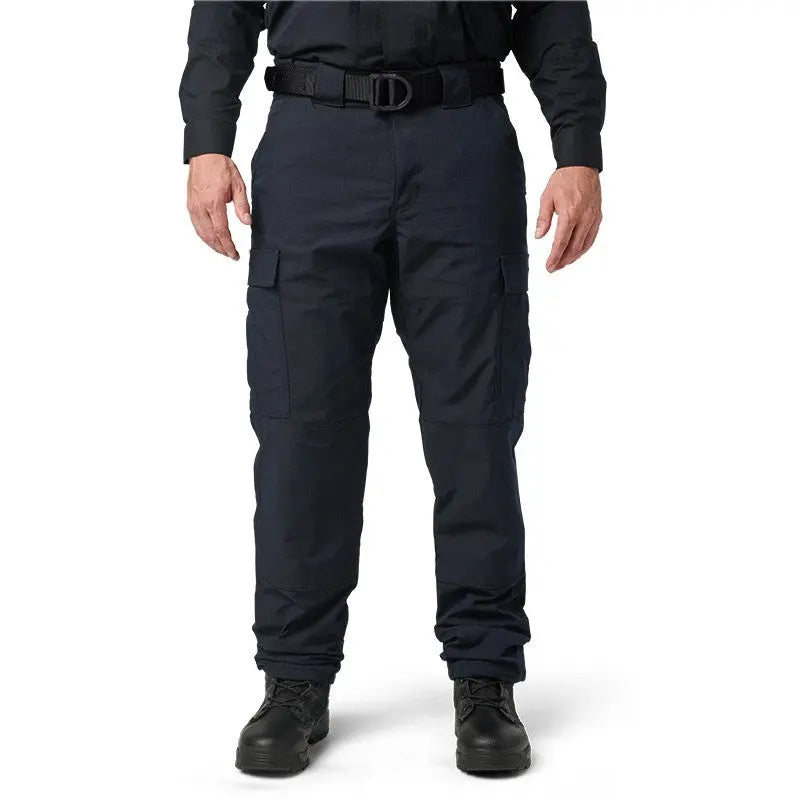 5.11 Pantalon Flex-Tac TDU Ripstop Dark Navy conçu pour les missions tactiques avec des poches cargo TacTec, renforcement des genoux, ceinture auto-ajustable et finition Tef