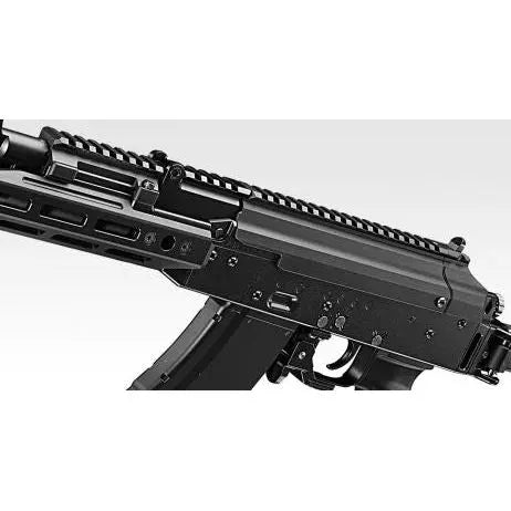 Tokyo Marui AKX GBBR avec fonctionnement réaliste, externe réaliste, viseurs réglables, options de cache-flamme et chargeur en aluminium. Utilise du gaz HFC134A.