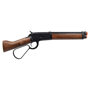"Carabine A&K Winchester M1873 gaz noir, corps métal, crosse bois, levier métal, chargeur 25 coups, hop-up réglable."